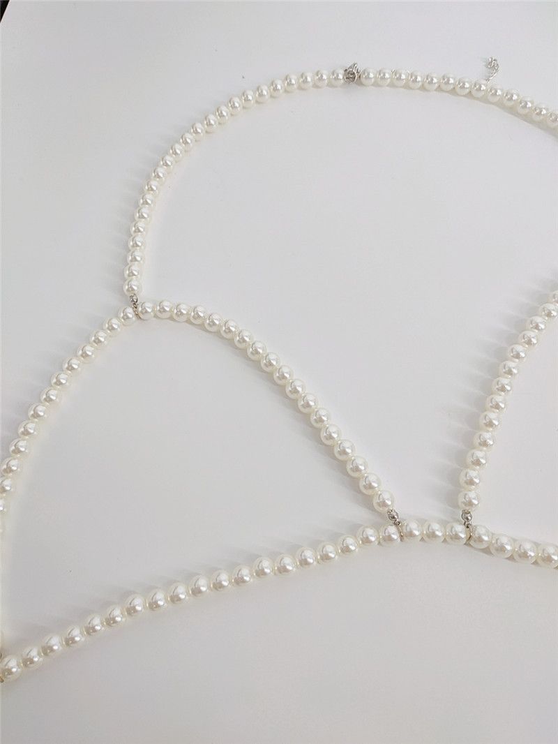 Abbigliamento per collana con gilet, grande perla, atmosfera semplice da discoteca_voghion.com
