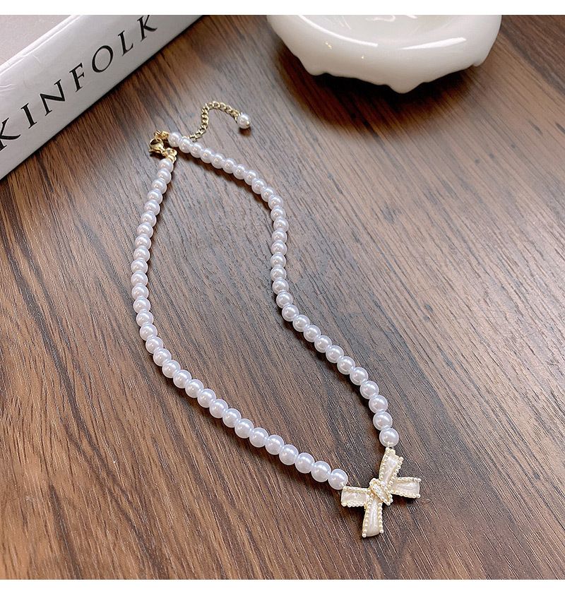 Elegante parelketting voor vrouwen in stijl, licht luxe niche-ontwerp, veelzijdige strik sleutelbeenketting_voghion.com