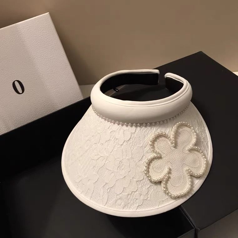 Top vuoto in stile forcina in pizzo jacquard coreano per viaggi estivi, parasole leggero con fiori di perle che riduce l'età e sole_voghion.com