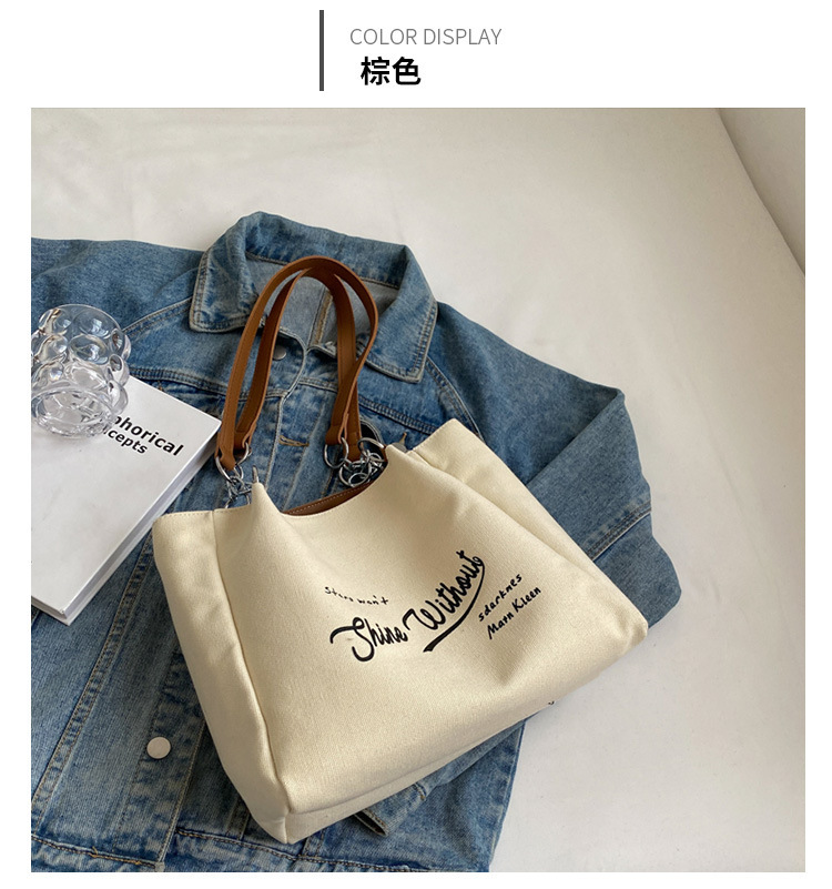 03 New Canvas Girls' Chain Advanced Sense Trend Portable Tote Bag Commuting Simple and Large Capacity_voghion.com