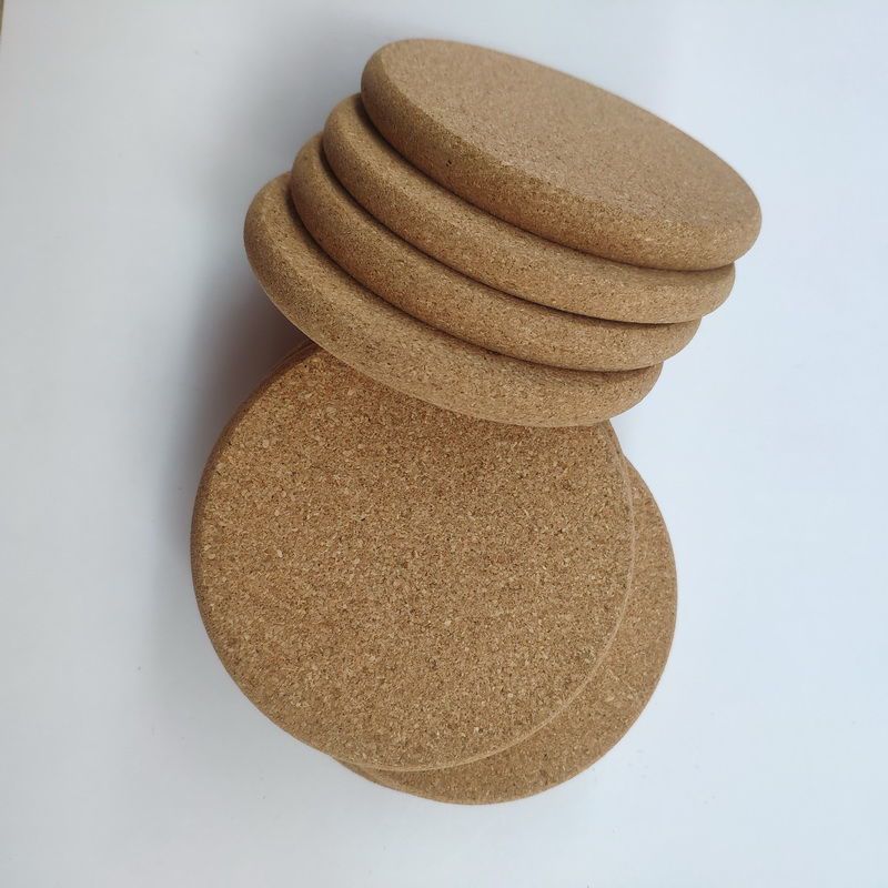 5-pack ronde kurken onderzetters met gladde randen - hittebestendig en antislip voor hete schalen en kopjes (milieuvriendelijk, duurzaam en vaatwasmachinebestendig)_voghion.com