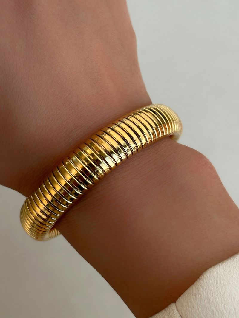 Bracciale Gypsy elastico in acciaio al titanio placcato oro vero_voghion.com