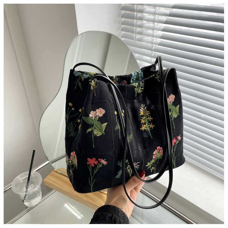 Large Capacity Embroidered Tote Bag Women's 2024 Spring and Summer New Niche Canvas Embroidered Shoulder Bag Commuter Bucket Bag_voghion.com