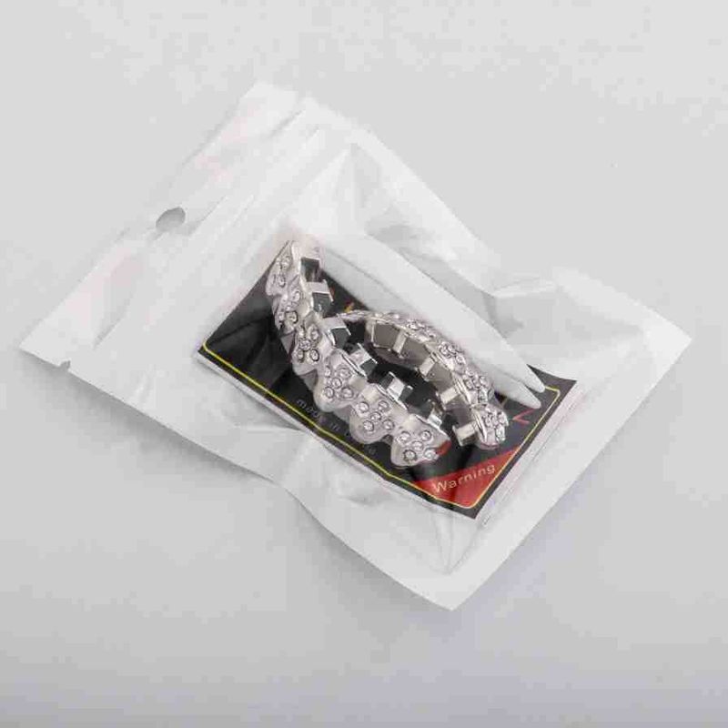 Grillz per denti Hip Hop con diamante rotondo e design a croce - Opzioni oro, argento, nero e rosso - Gioielli dentali unisex per rapper e appassionati di moda_voghion.com