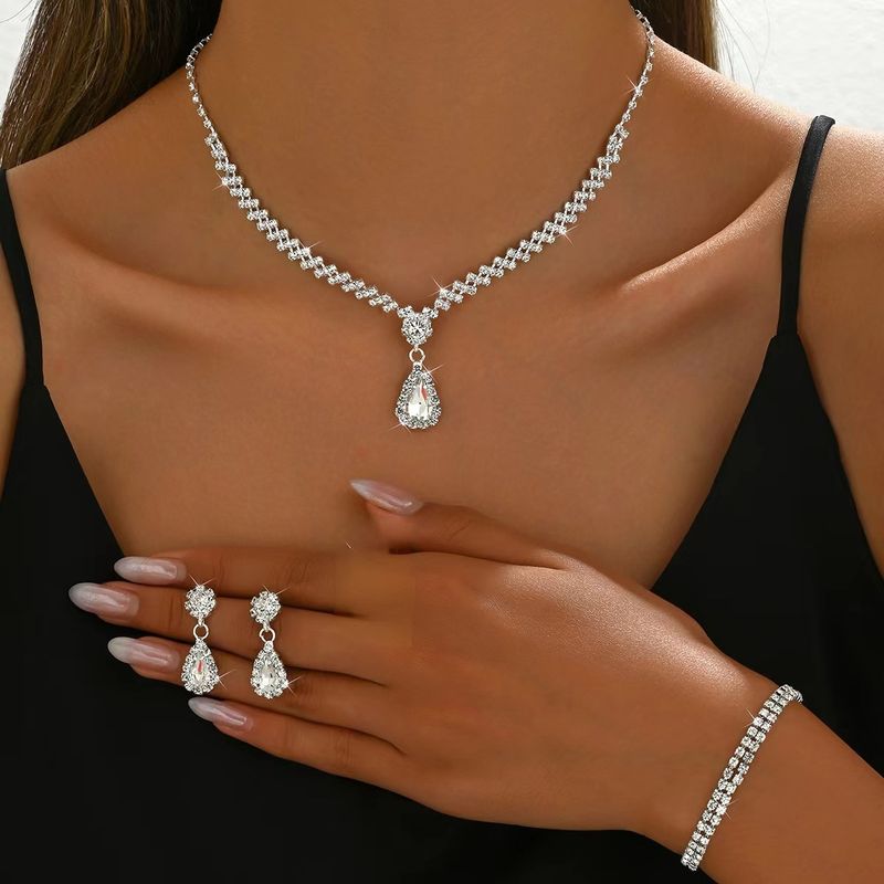 Set di tre gioielli da sposa, orecchini, collana e bracciale da donna, accessori di lusso di alta gamma_voghion.com