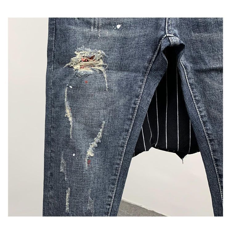 2023 Mode Herrenhose im koreanischen Stil, Jeans mit Katzenschnurrhaarlöchern, bunten Farbspritzern, schmale Hose_voghion.com