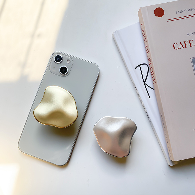 Metal advanced electroplated mobile phone airbag bracket adhesive and extendable desktop air cushion support, back with_voghion.com