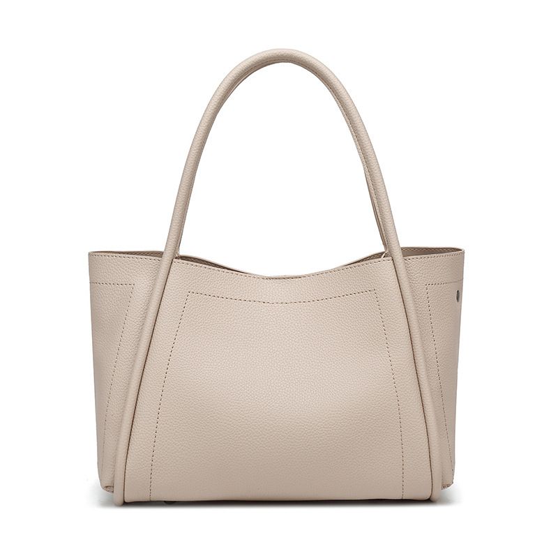 2025 New Casual Niche Simple Soft Leather Handbag Basket For Women Office Commute Versatile Crossbody Bag_voghion.com