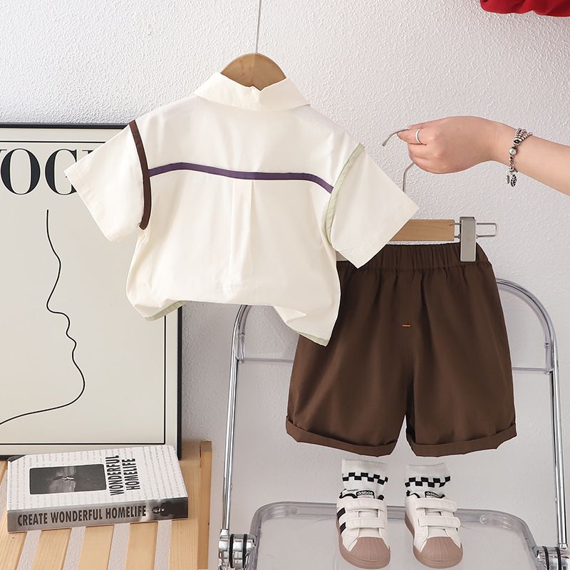Vestito estivo per bambini 2025, nuovo set di due pezzi con camicia a maniche corte e bordo arrotolabile, vestiti per bambini_voghion.com