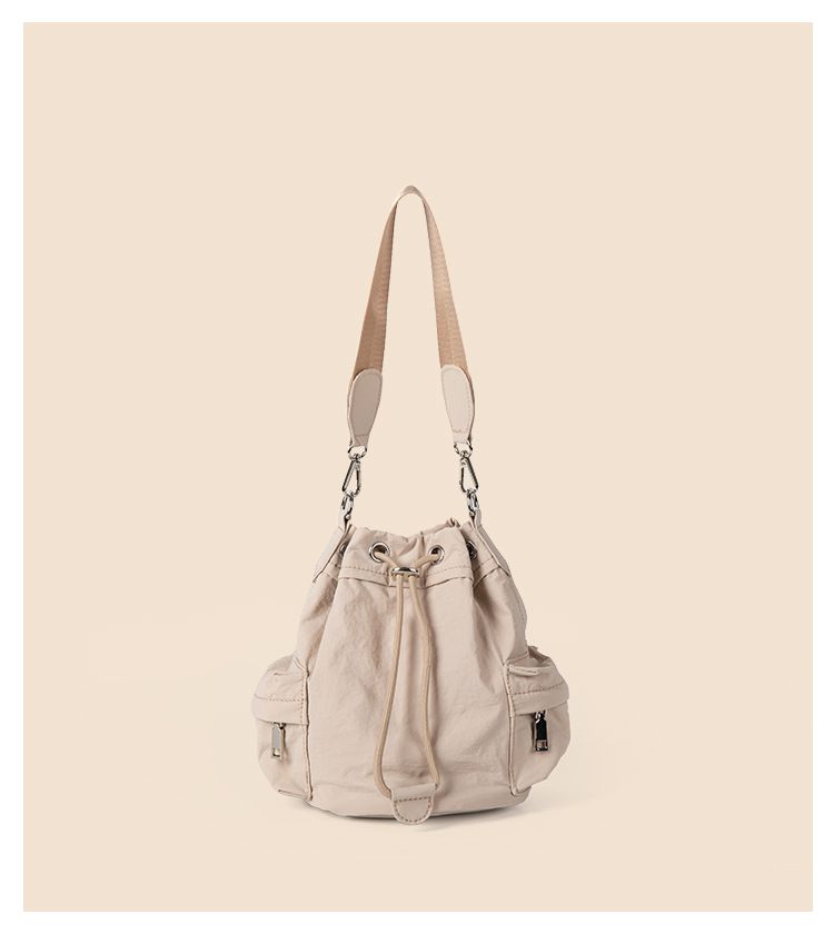 Niche nylon shoulder with drawstring drawstring, multiple pockets, bucket versatile for autumn and winter, casual_voghion.com