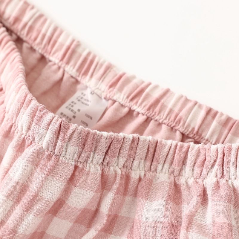 Conjunto de pijama de algodão macio e respirável de camada dupla para mulheres e homens - Roupa aconchegante para casa com xadrez clássico e cores sólidas_voghion.com