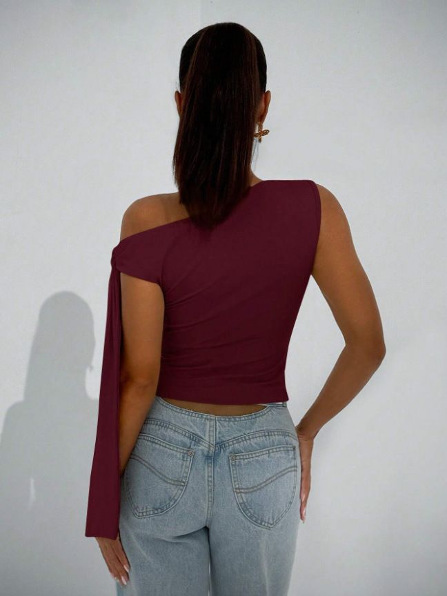 Ropa de mujer, novedad de verano 2025, moda urbana, corte entallado, lazo diagonal, color liso, sin mangas_voghion.com