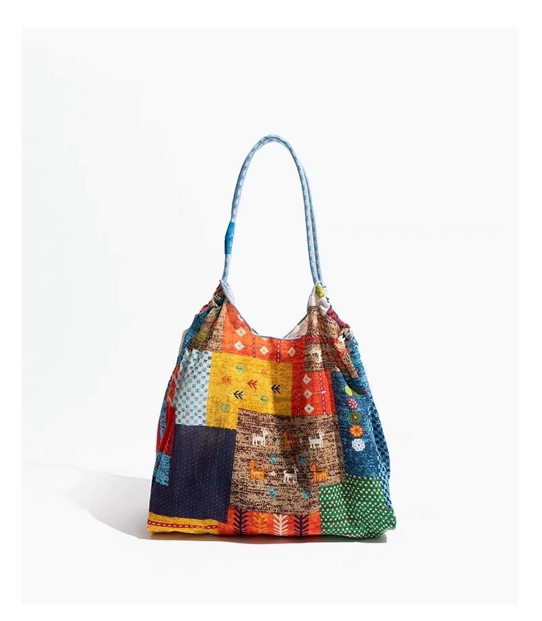 Borsa a tracolla etnica in denim bohémien, in tela bifacciale, patchwork vintage originale nepalese per donna_voghion.com