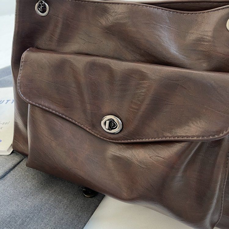 Our women's bag is not just an accessory, but also a symbol of your confidence. Shoulder bag, zipper, stitching PU_voghion.com