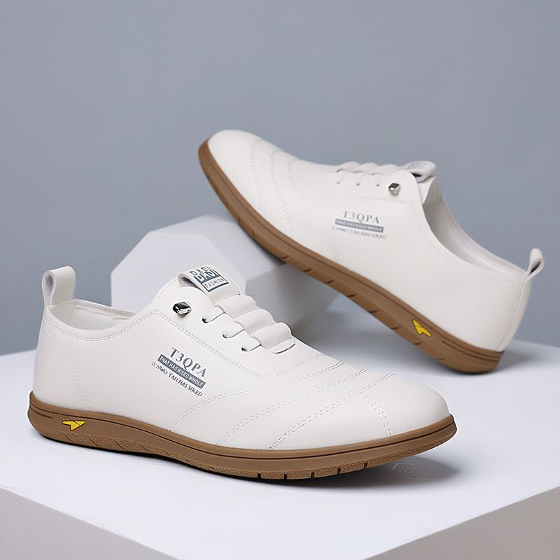 Mocassini da uomo in pelle bianca con punta arrotondata, stile casual e business_voghion.com