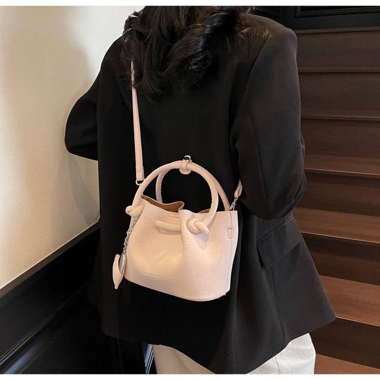 Spring New Personalized Solid Color Folding Drawstring Beaded Bow Shoulder Crossbody Bag_voghion.com