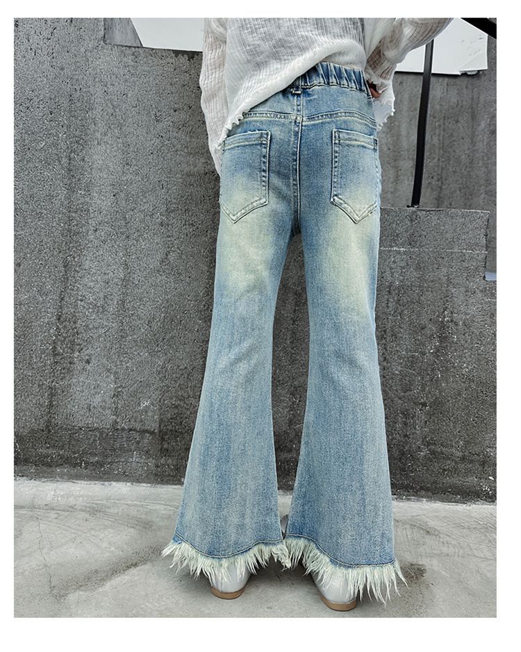 Ropa para niños Niñas 2024 primavera y otoño nuevos modelos para niñas medianas y grandes elegantes pantalones acampanados de mezclilla con borde sin rematar con borlas de perlas_voghion.com