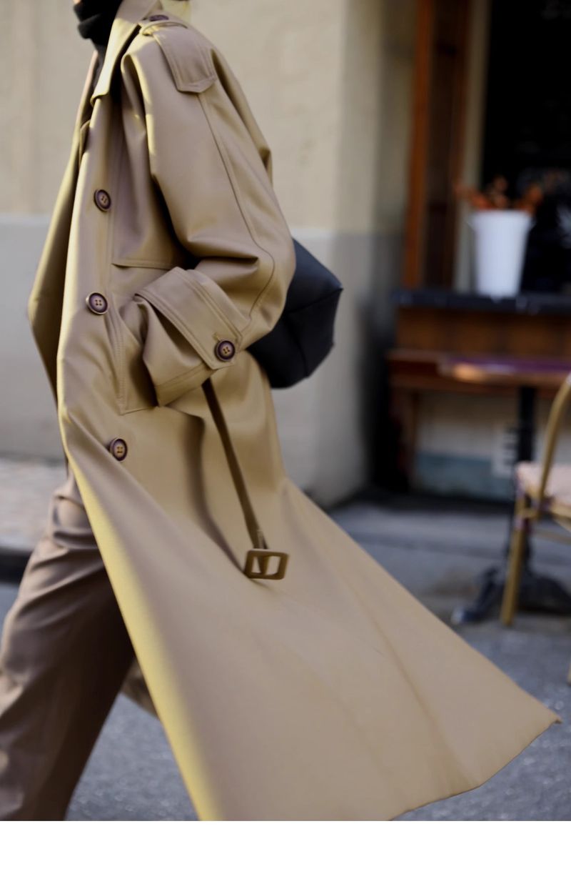 Trench classico doppiopetto da donna - Giacca sartoriale di media lunghezza con revers a lancia, silhouette strutturata e tasche funzionali_voghion.com