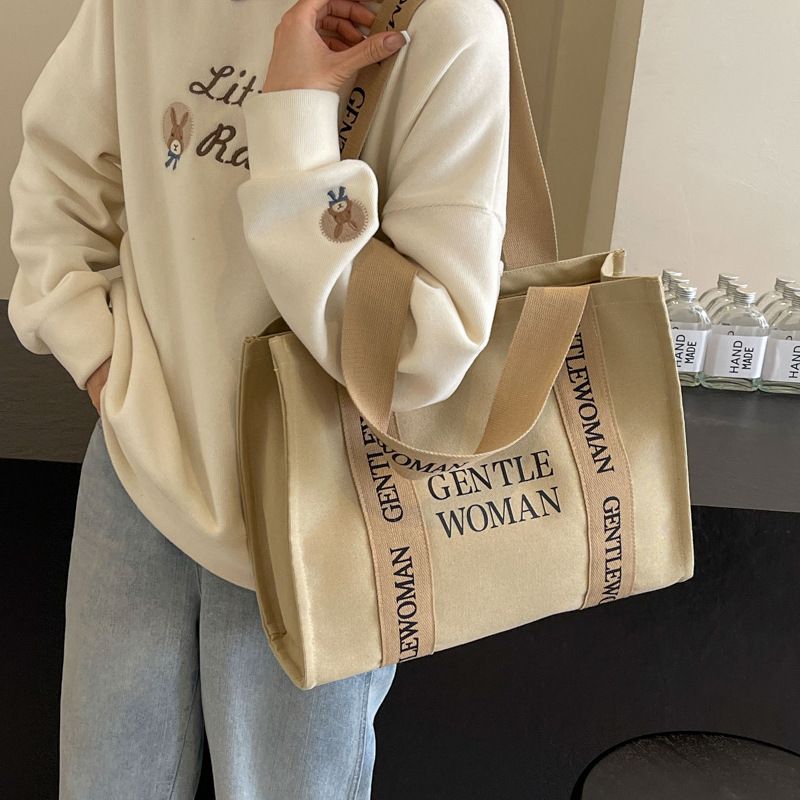 Large capacity canvas for women 2024 new fashionable letter class commuting handbag simple casual shoulder bag_voghion.com