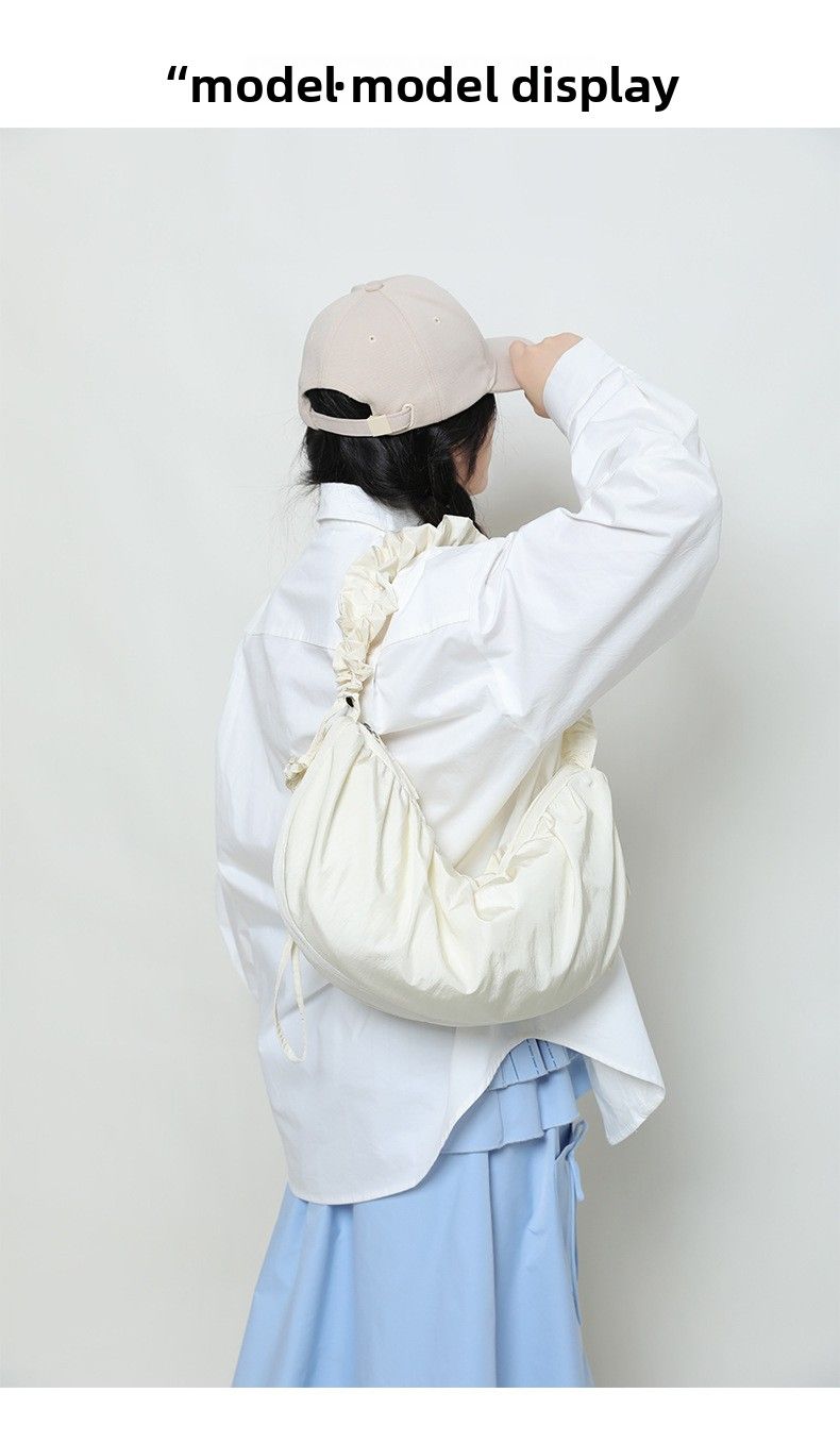 Frühling Koreanische Plissee Handheld Wolke Frische Künstlerische Polyester Knödel Faul Stil Wasserdichte Halbmond Tasche_voghion.com