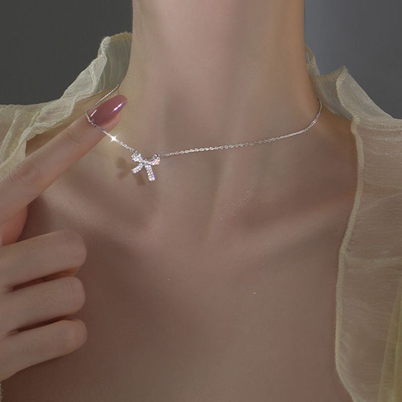 Collana in acrilico alla moda, perline d'argento e cristalli a forma di fiocco, gioielli da sera da donna_voghion.com