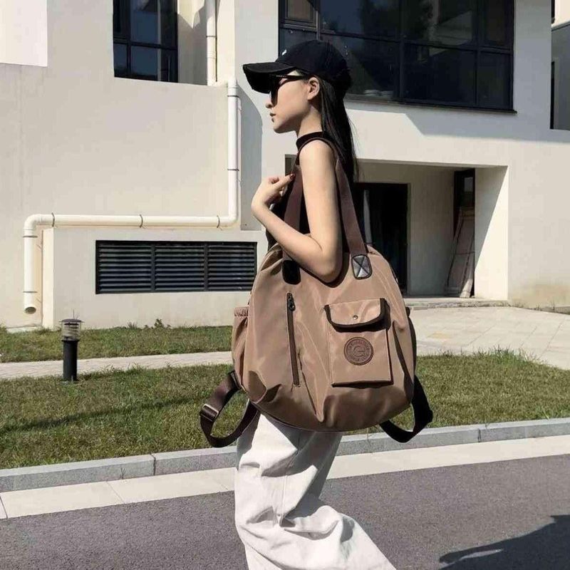 Zaino da viaggio casual da donna di grande capacità 2025, borsa impermeabile alla moda in tessuto Oxford_voghion.com