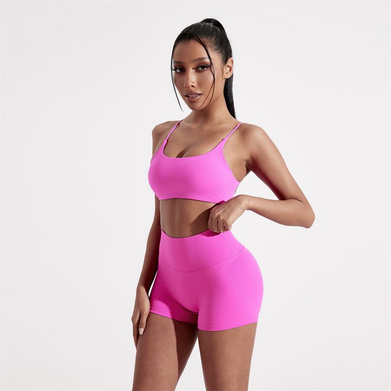 Summer Solid Color Yoga Set Two-Piece Sexy Back Cross Sports Bra + Barely There Tight-Fitting Three-Quarter Shorts_voghion.com