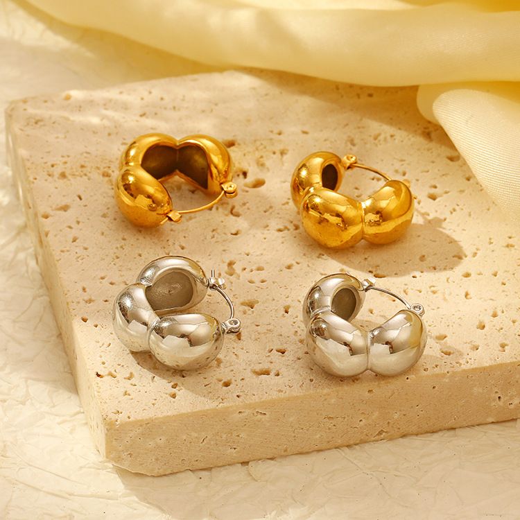 Orecchini a tre emisferi in acciaio inossidabile dorato con temperamento europeo e americano alla moda transfrontaliera, popolari semplici orecchini in acciaio al titanio e_voghion.com