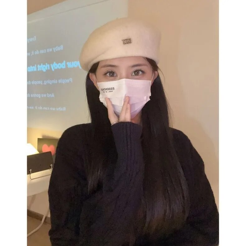 French temperament irregular beret women's autumn and winter face small shaped bud hat white wool painter hat
_voghion.com