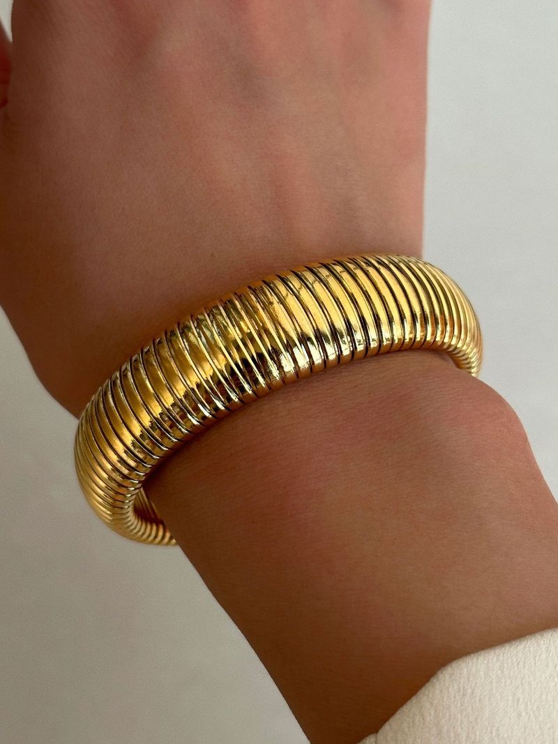 Bracciale Gypsy elastico in acciaio al titanio placcato oro vero_voghion.com