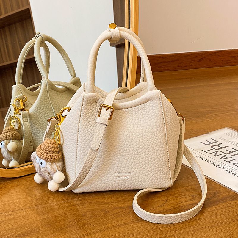 Yuezi Popolare Nuovo Secchio d'Acqua 2024 Texture Western Lychee Modello Moda Piccola Borsa a Tracolla da Pendolarismo_voghion.com