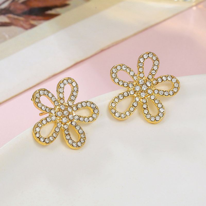 Set di gioielli da donna, versione alla moda di orecchini a forma di fiore con diamanti, orecchini leggeri e di lusso di alta gamma, design di nicchia, orecchini in stile freddo._voghion.com