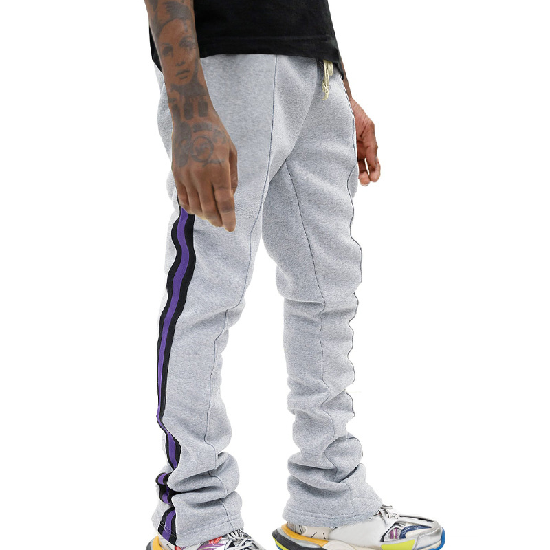 Calça esportiva casual listrada e boca de sino para primavera e outono, nova calça comprida e justa para homens, calça da moda_voghion.com