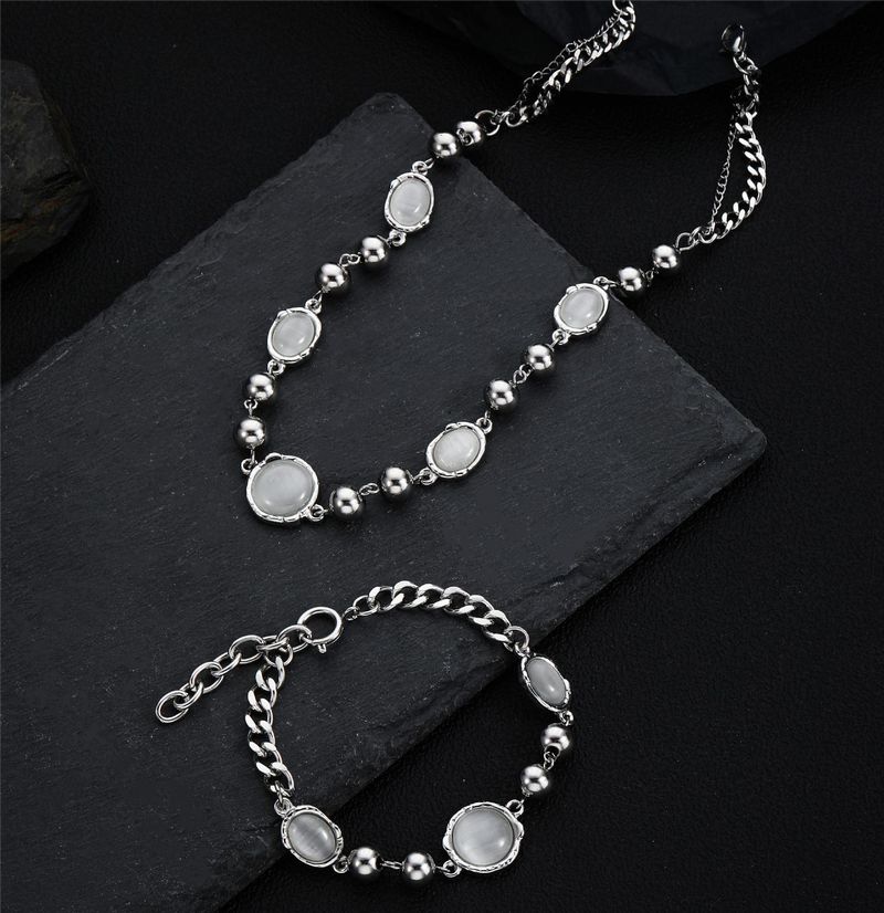 Design di nicchia luce lusso temperamento titanio acciaio occhio di gatto collana elemento bianco chiaro di luna uomini e donne accessori catena clavicola gioielli_voghion.com