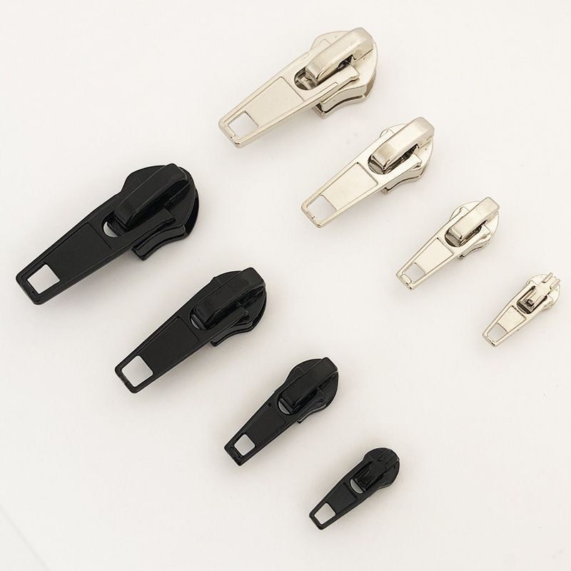 Nr. 3 Nr. 5 Nr. 8 Nr. 10 Biksēm paredzēts rāvējslēdzējs ar slēdzeni Automātiska rāvējslēdzēja galviņa Neilona rāvējslēdzējs Piederumi Drēbēm paredzēts rāvējslēdzējs ar galviņu_voghion.com