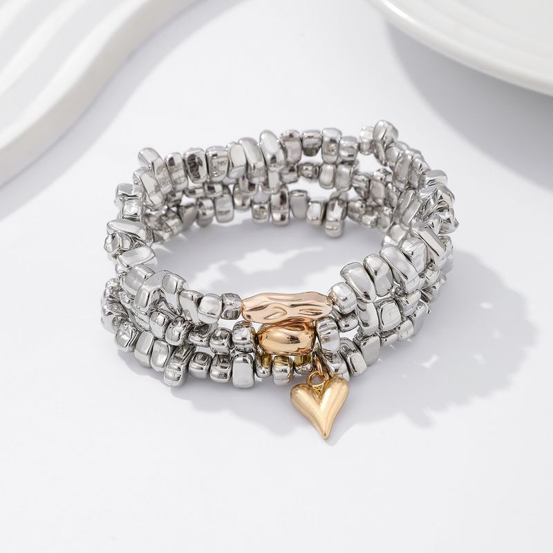 Ciondolo a forma di cuore con design irregolare, stile Ins, dolce e fresco, bracciale con perline impilate CCB_voghion.com