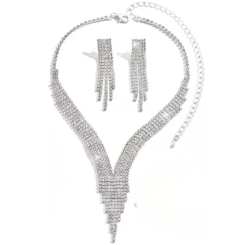 Elegante collana con frange di strass e design geometrico per feste serali, set speciale di collana con nappe scintillanti e diamanti_voghion.com