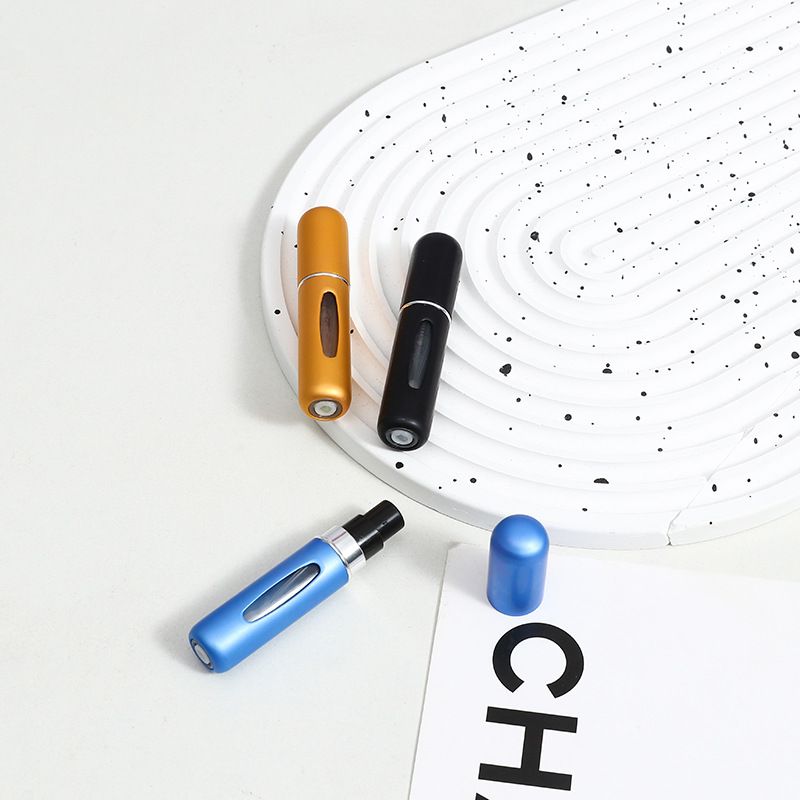 Mini flacon pulvérisateur portable à pompe automatique de 5 ml avec fond amovible_voghion.com