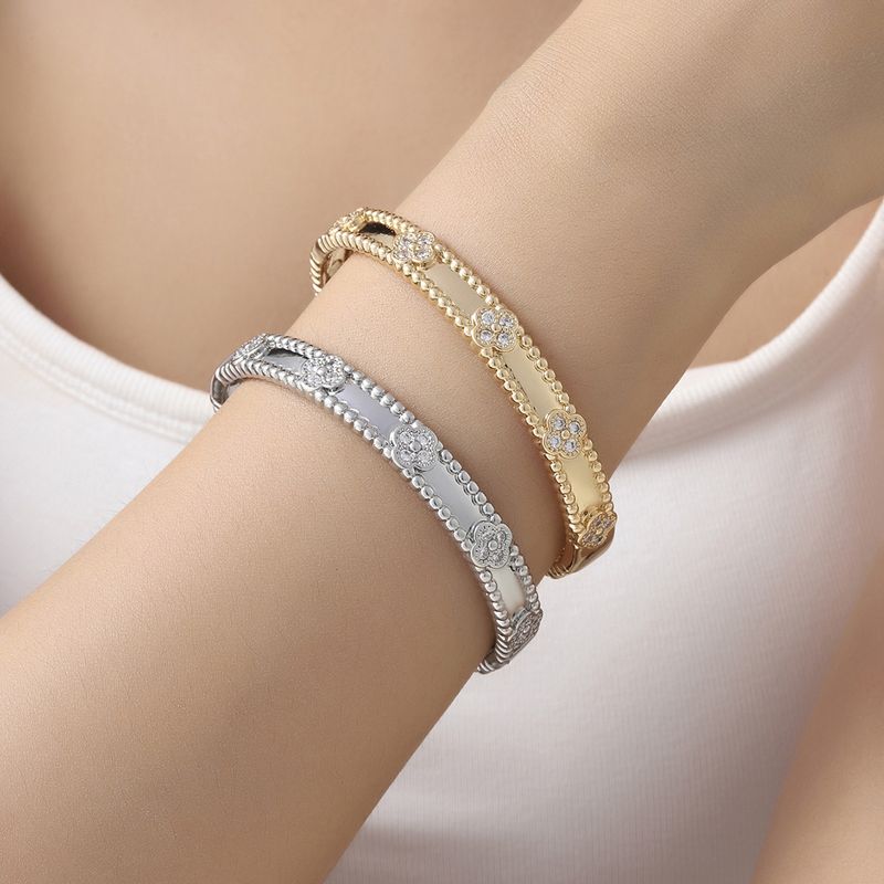 Bracciale caleidoscopio in zircone alla moda per donna, bracciale quadrifoglio con diamanti placcato oro rame, versatile_voghion.com