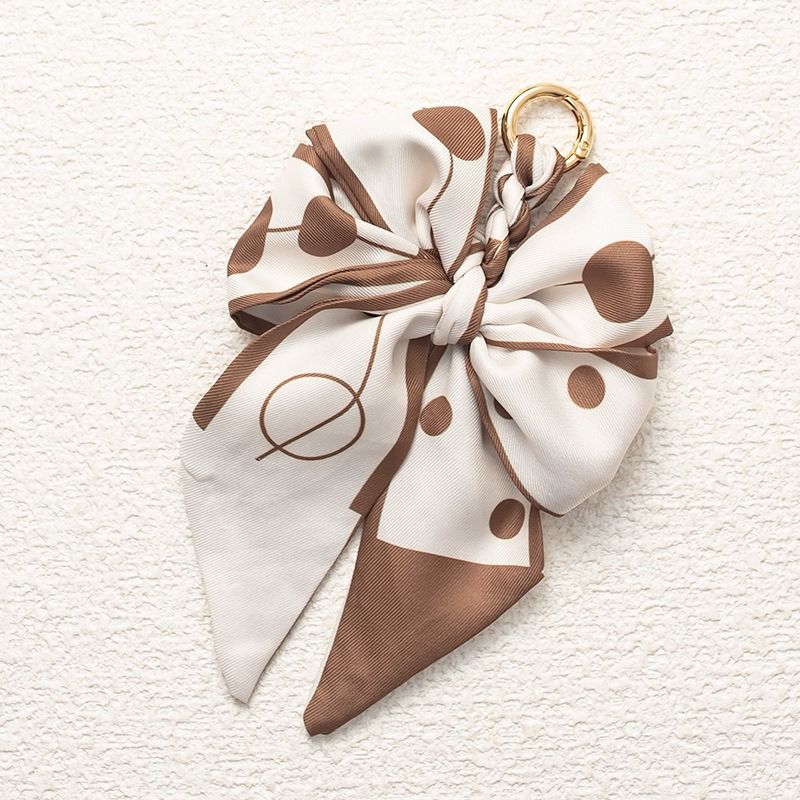 2025 Autumn And Winter Fashion Bag Accessories Keychain Woven Bag Pendant Decorative Bow Bag Pendant Versatile High Sense Retro_voghion.com