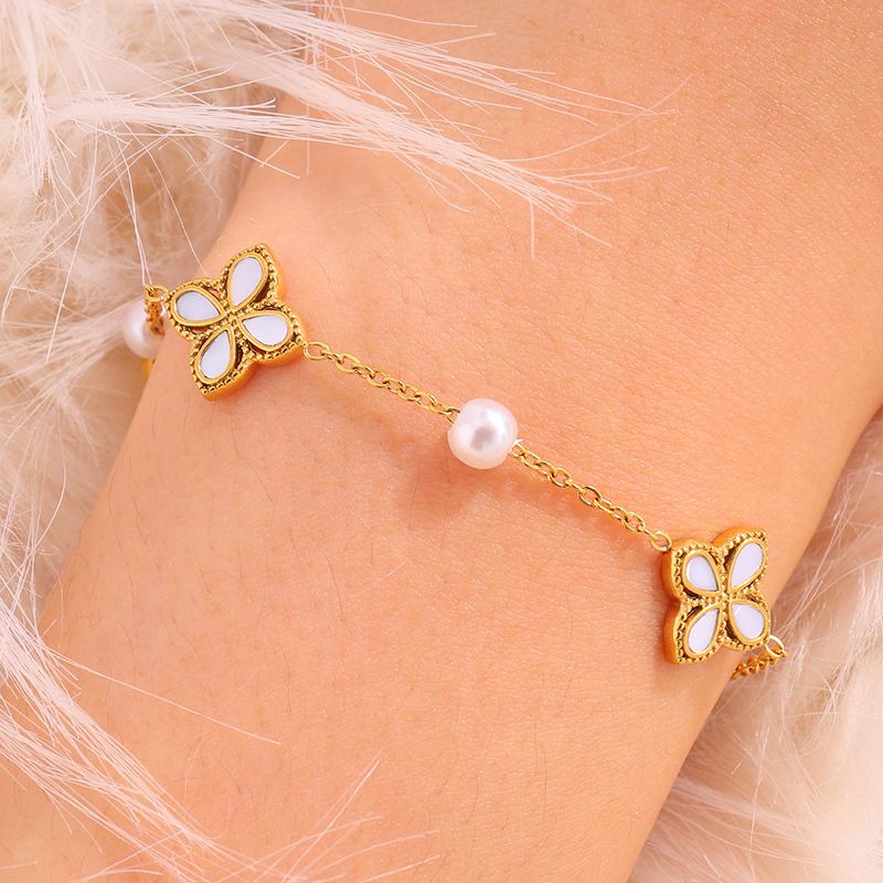 Diamantarmband Damenarmbänder Gold Titanstahlarmband Neue Mode Zirkon Glück für Frauen Hohe Version Nische Vierblättriges Kleeblattarmband Hell L_voghion.com