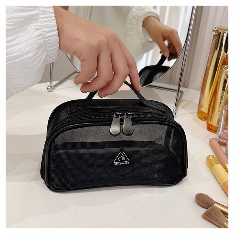 2024 Nova Maquiagem Feminina Portátil Grande Capacidade Luxo Saída 3 CEO Malha Preta Bolsa De Armazenamento De Lavagem_voghion.com