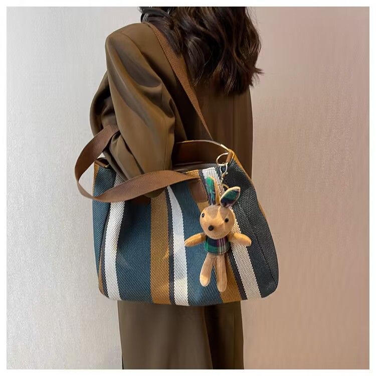 Neue trendige Umhängetasche, modische urbane Handtasche mit großer Kapazität und Canvas-Textur, einfache Pendler-Tragetasche_voghion.com