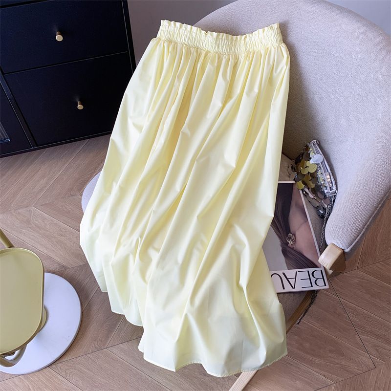 Gonna gialla da donna, a vita alta, a trapezio, sottile, di media lunghezza, con grande gonna a ombrello._voghion.com