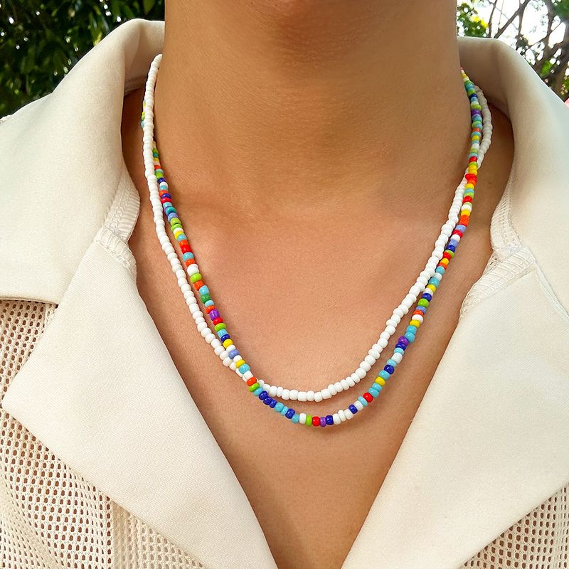 KunJoe - Juego de 2 gargantillas bohemias multicapa con cuentas de arroz de colores para hombres y mujeres, joyería de cadena corta hecha a mano 2024_voghion.com