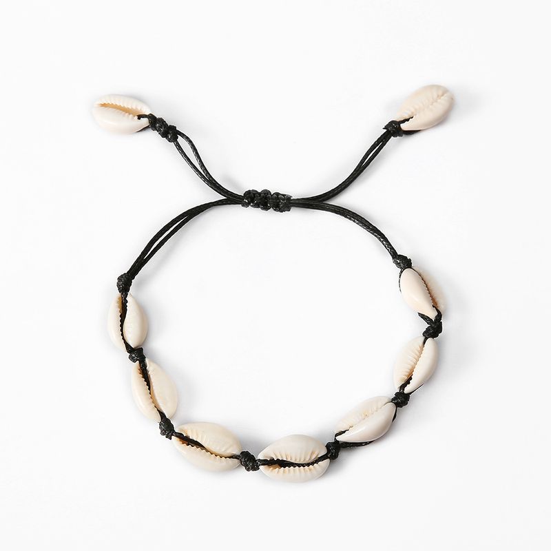 Beach style handcrafted black rope women's foot accessories with 9 shell anklets_voghion.com