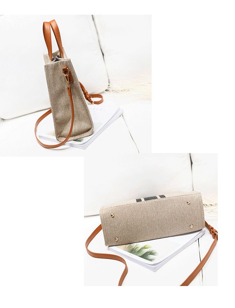 Versión coreana de maletín portátil para mujer, versátil para desplazamientos profesionales, rayas simples, un hombro, bolsa de lona de gran capacidad_voghion.com
