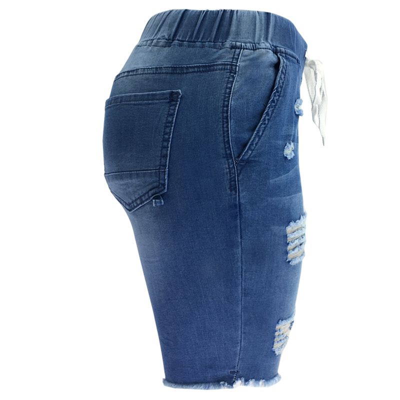 Jeans corti blu lavaggio medio elasticizzati a vita media strappati da donna_voghion.com