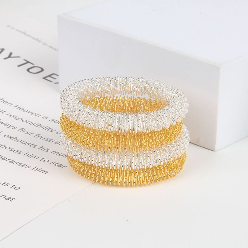 Juguetes para aliviar el estrés, masajeador de muñeca con resorte de descompresión, pulsera de resorte con forma especial, anillo de acero con resorte, juguete de metal de descompresión al por mayor._voghion.com