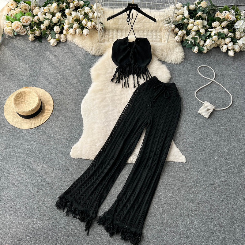 Completo da donna bohémien per le vacanze al mare, set da due pezzi per pantaloni cavi a vita alta con nappe lavorate a maglia estiva_voghion.com